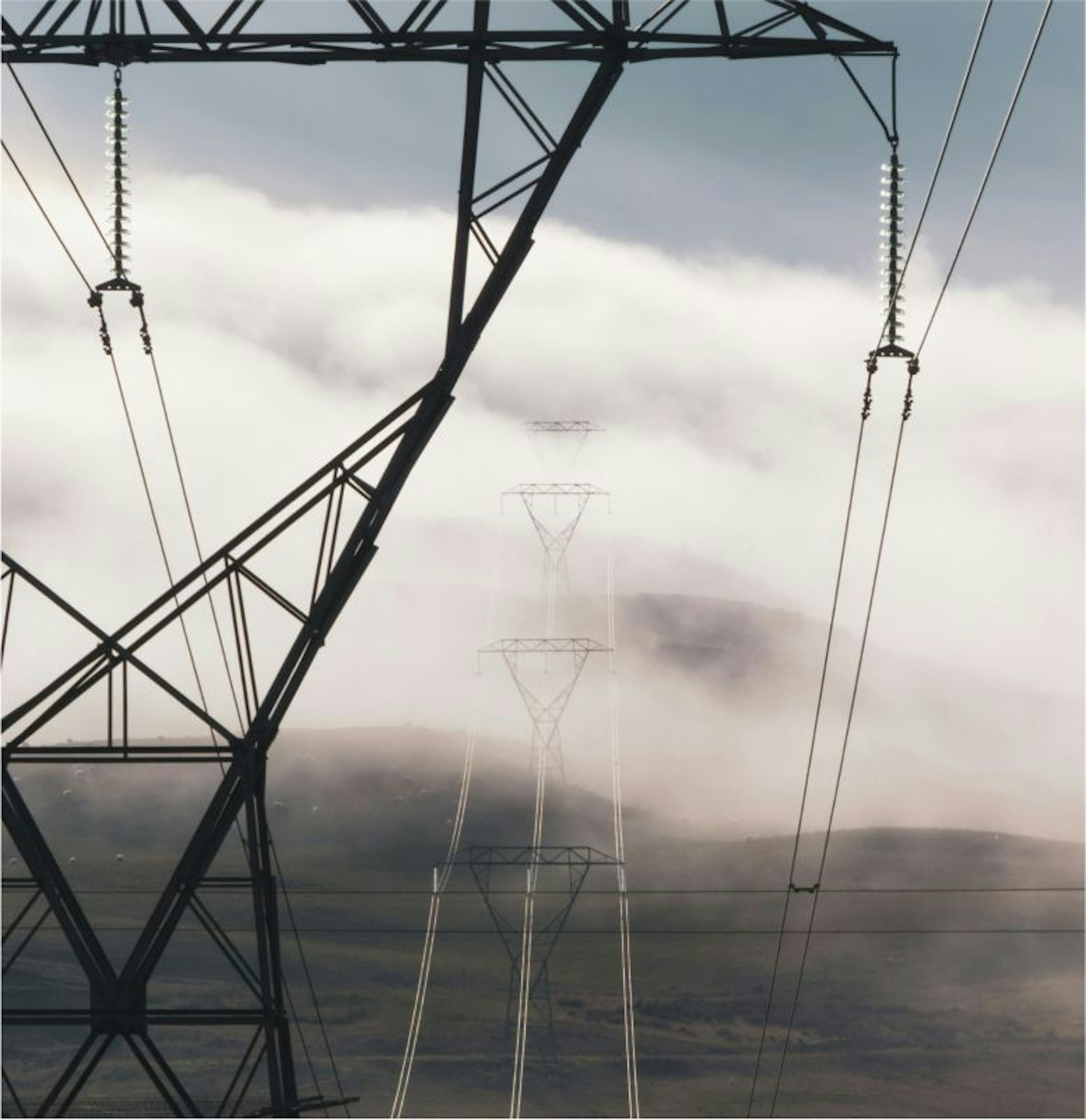 Electricity tower on a cloudy sky