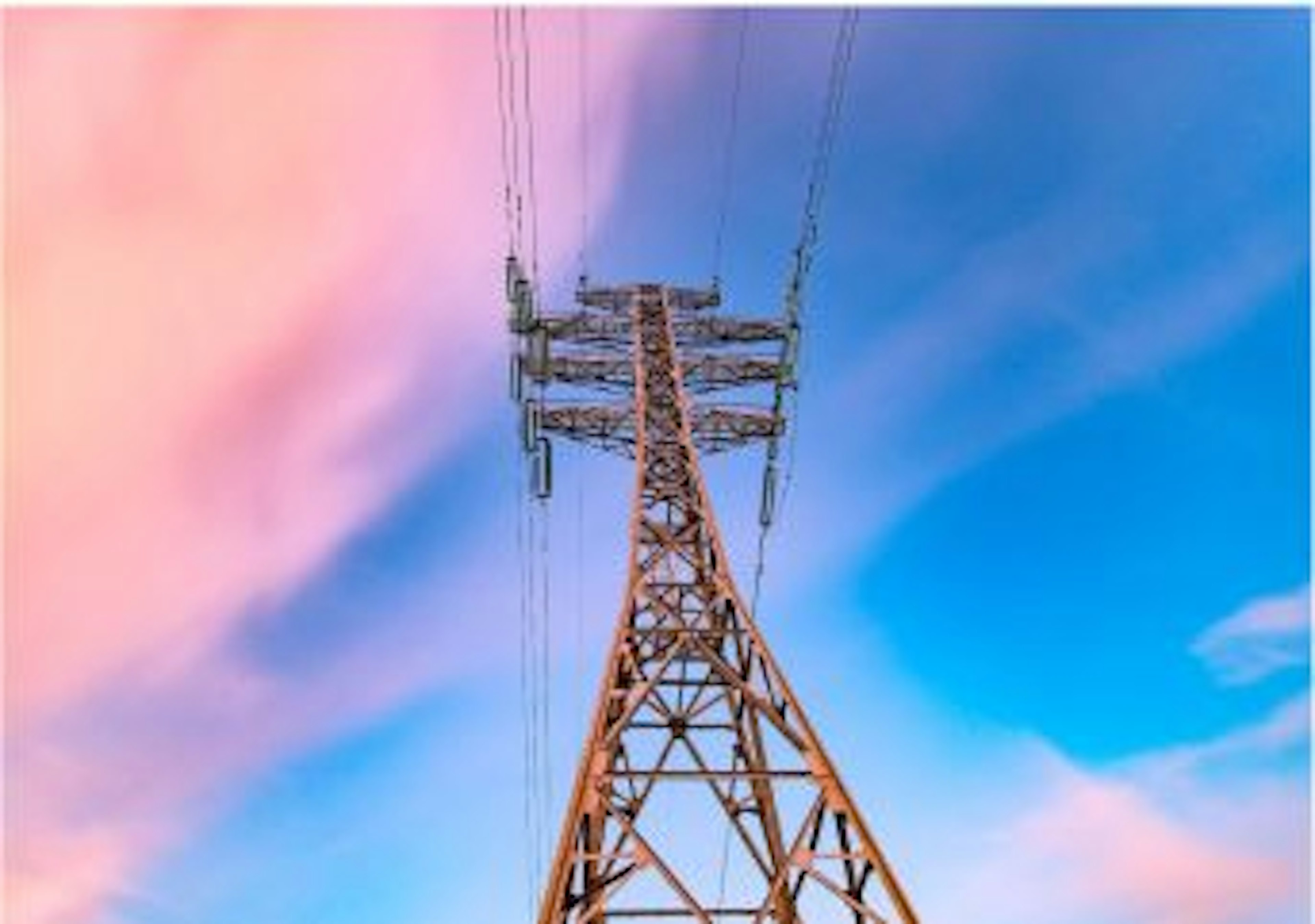 Electricity tower on a colorful sky